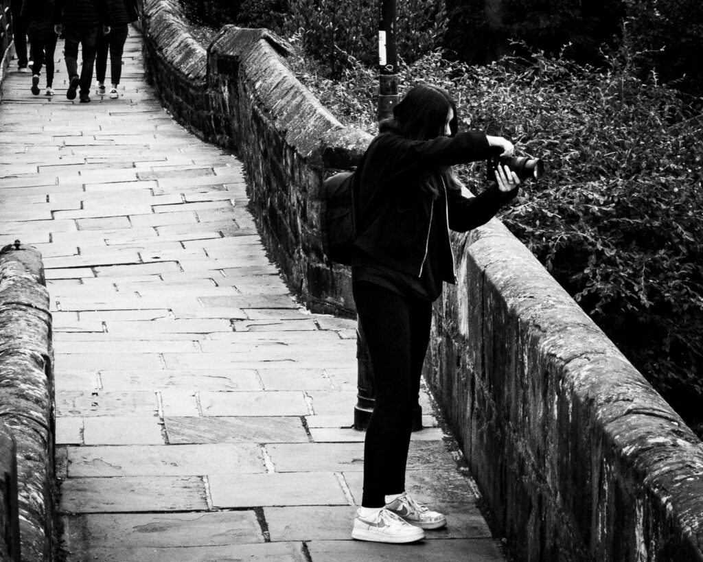 photographer on the bridge, chester